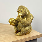15cm Gold Thinking Gorilla Holding Skull – Resin
