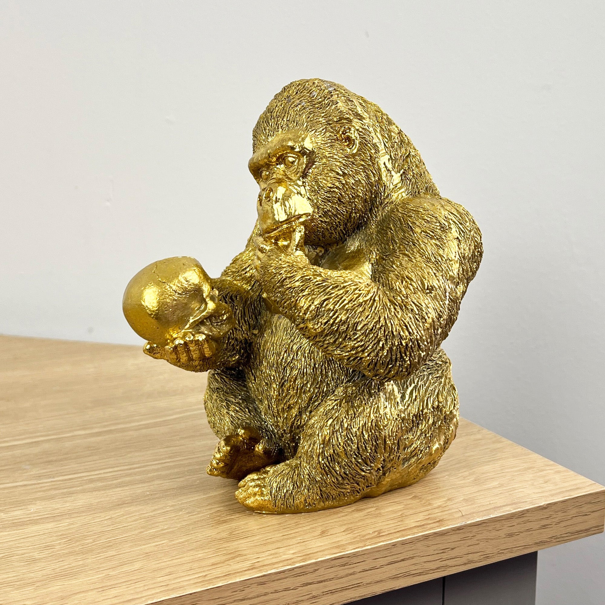 15cm Gold Thinking Gorilla Holding Skull – Resin