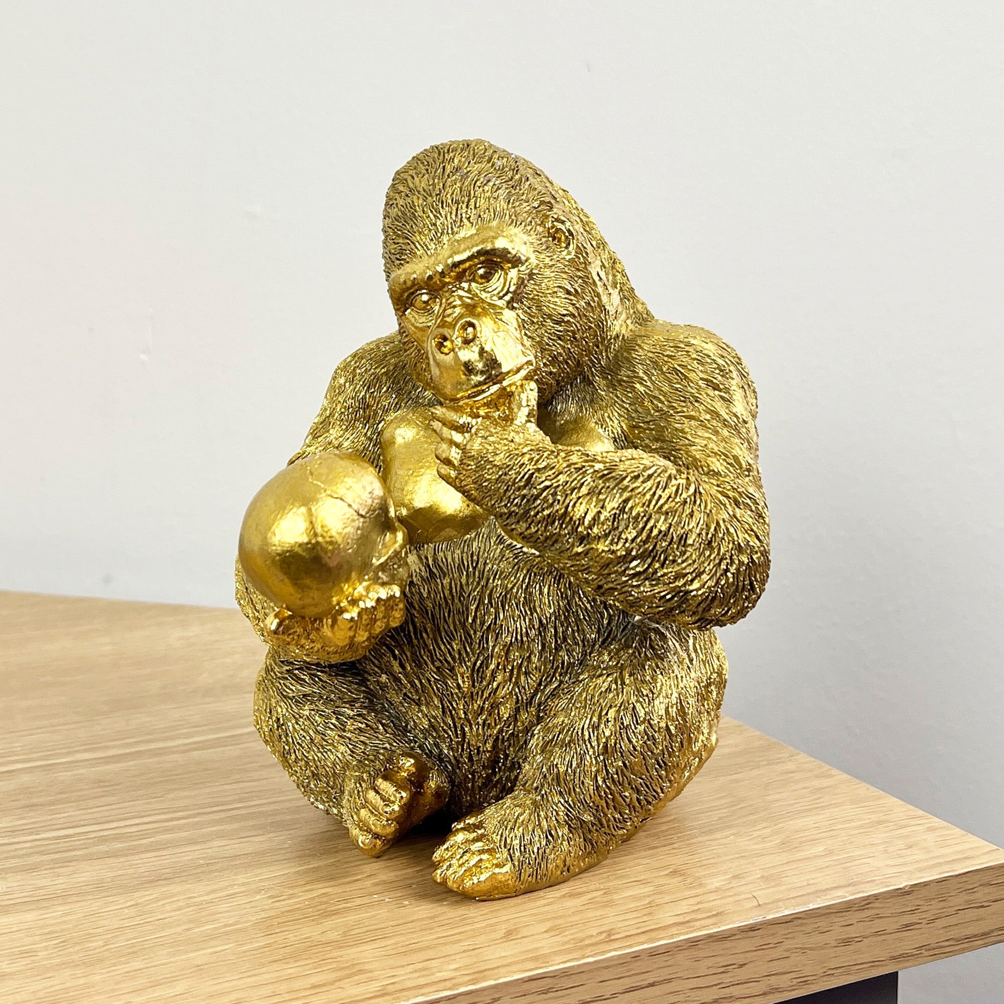 15cm Gold Thinking Gorilla Holding Skull – Resin