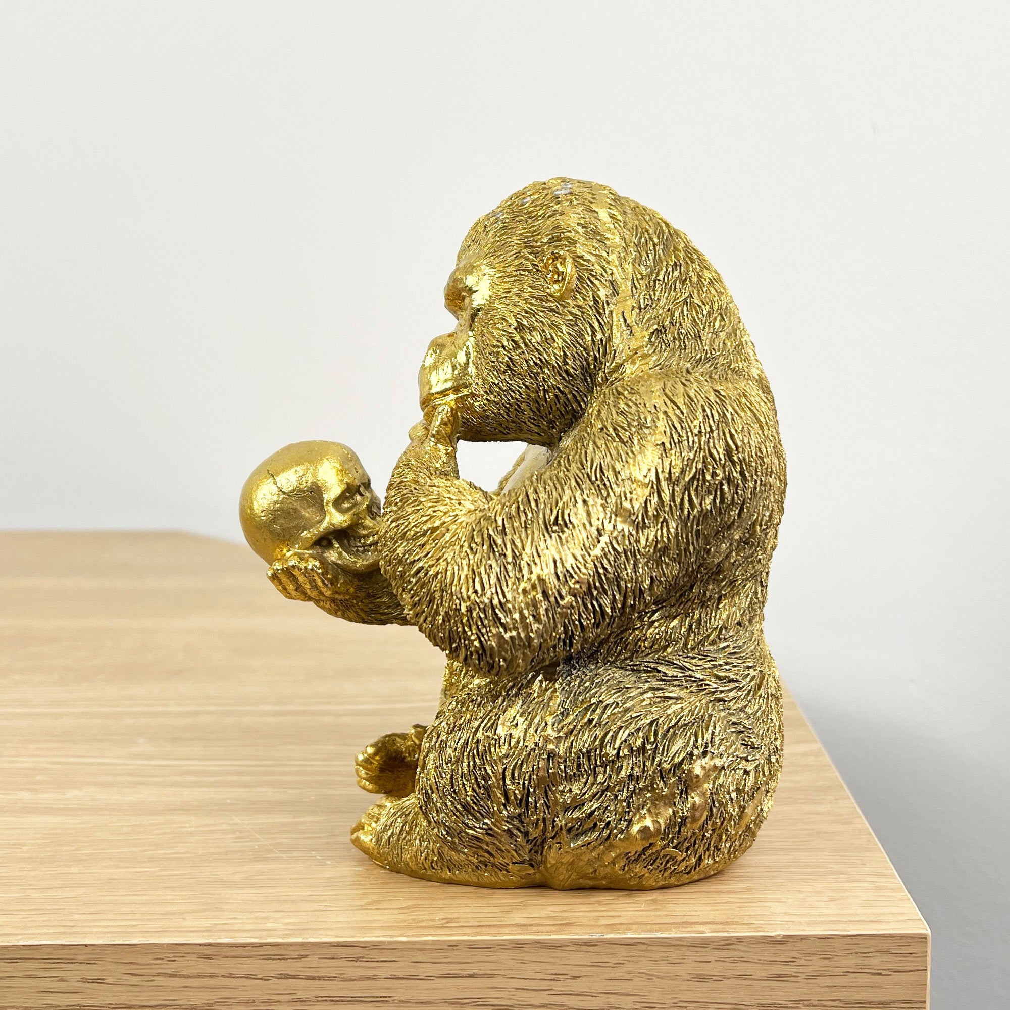 15cm Gold Thinking Gorilla Holding Skull – Resin