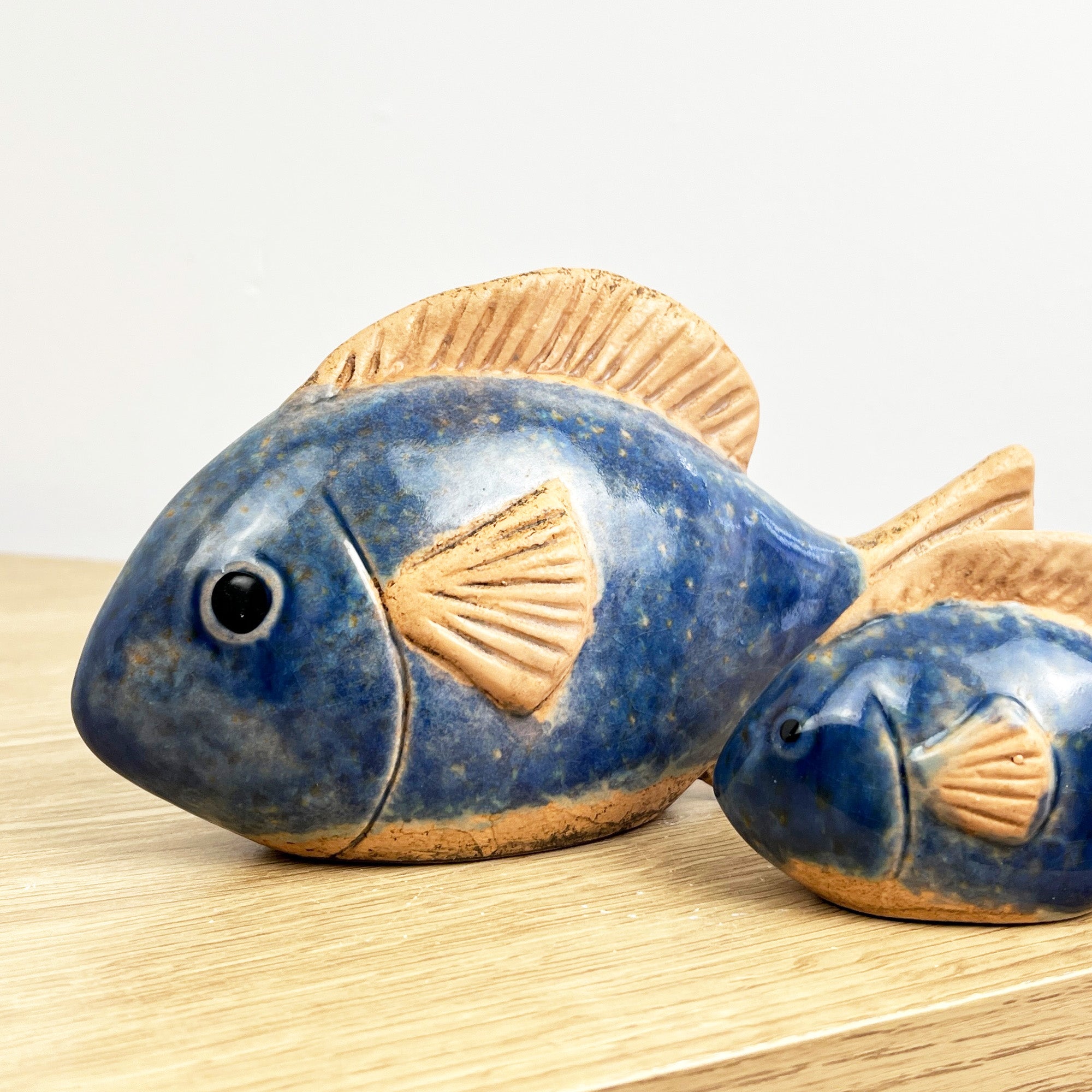 Pair of Blue Glazed Ceramic Fish Ornaments