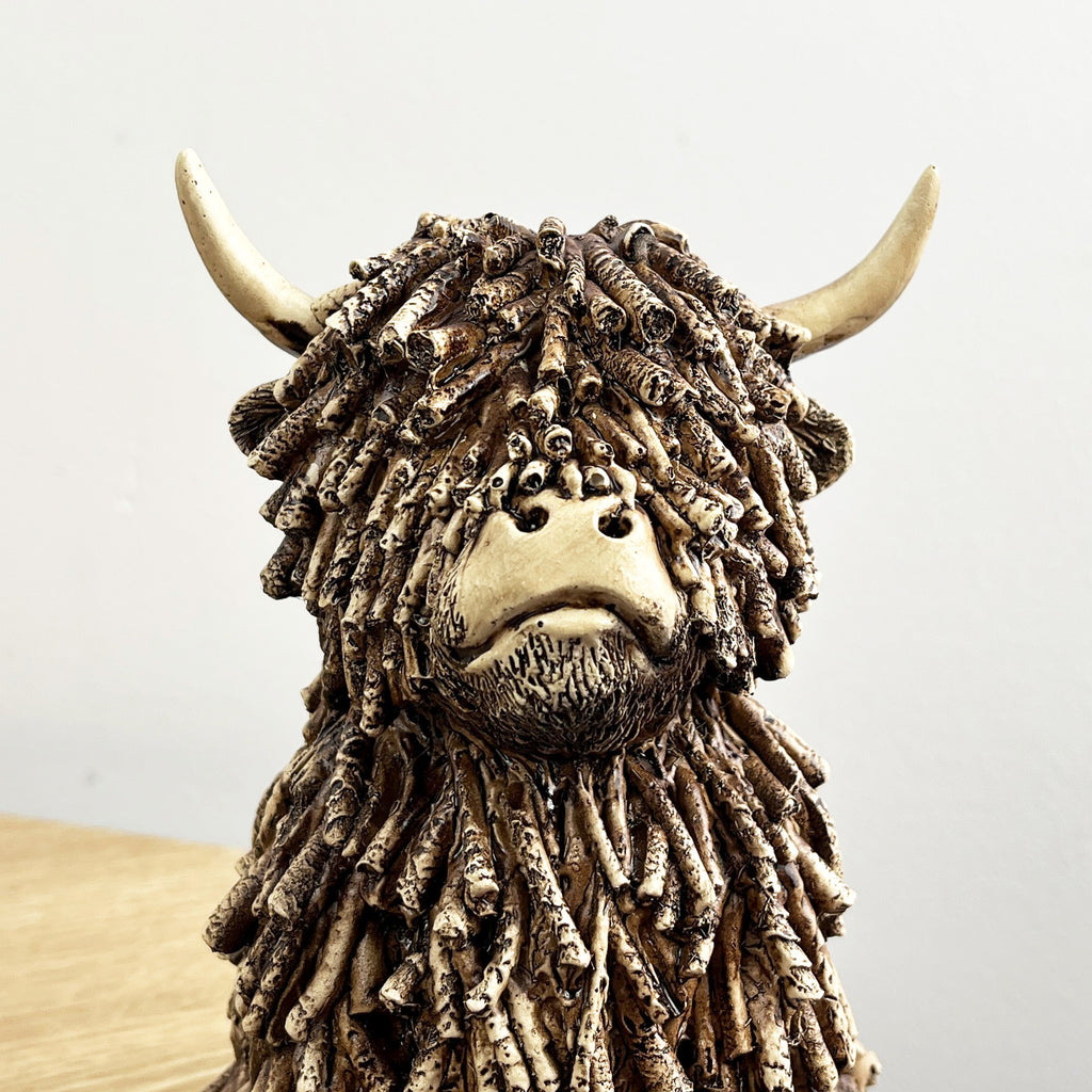 18cm Sitting Highland Cow Ornament / Figurine - Resin