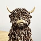 18cm Sitting Highland Cow Ornament / Figurine - Resin