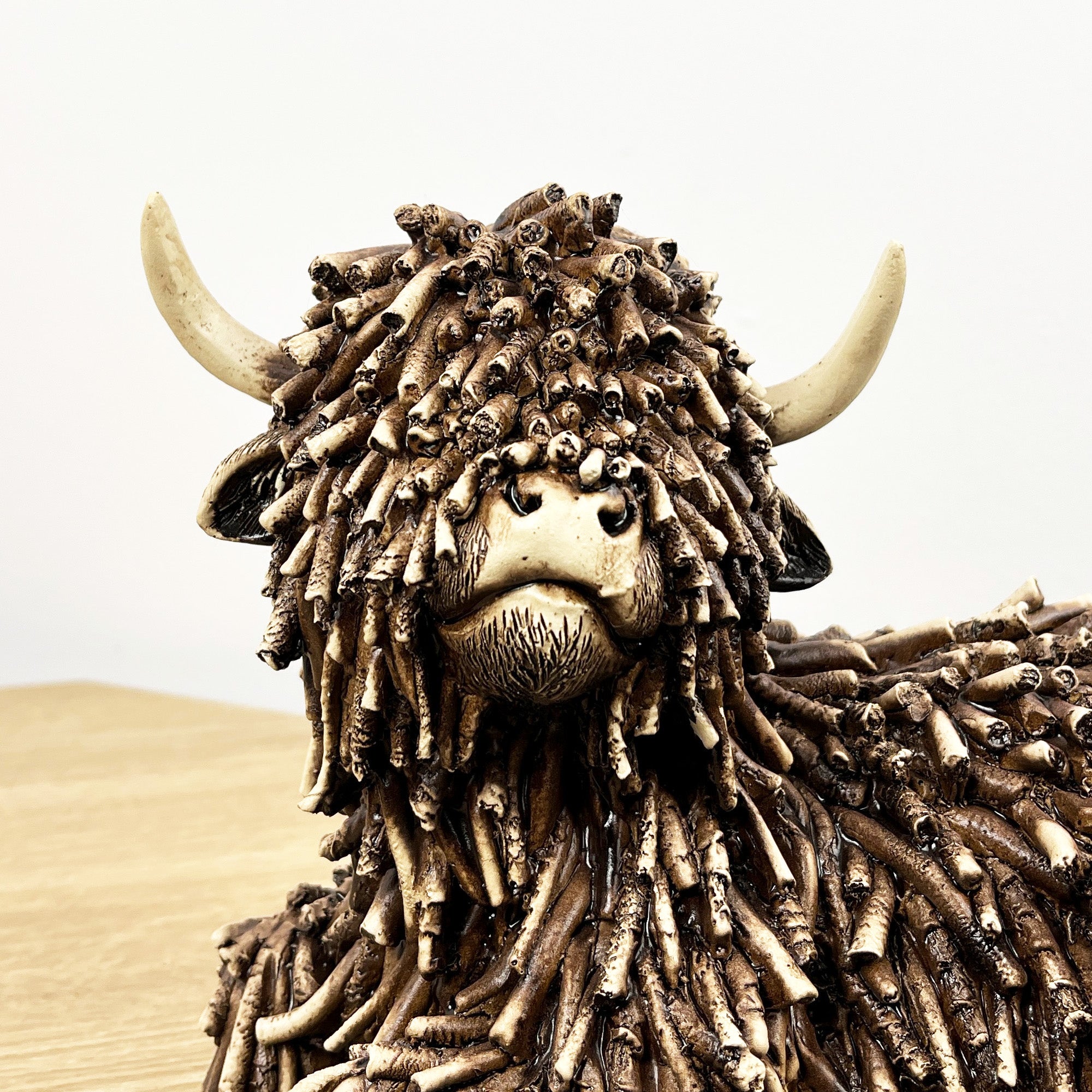 25cm Large Sitting Highland Cow Ornament / Figurine - Resin