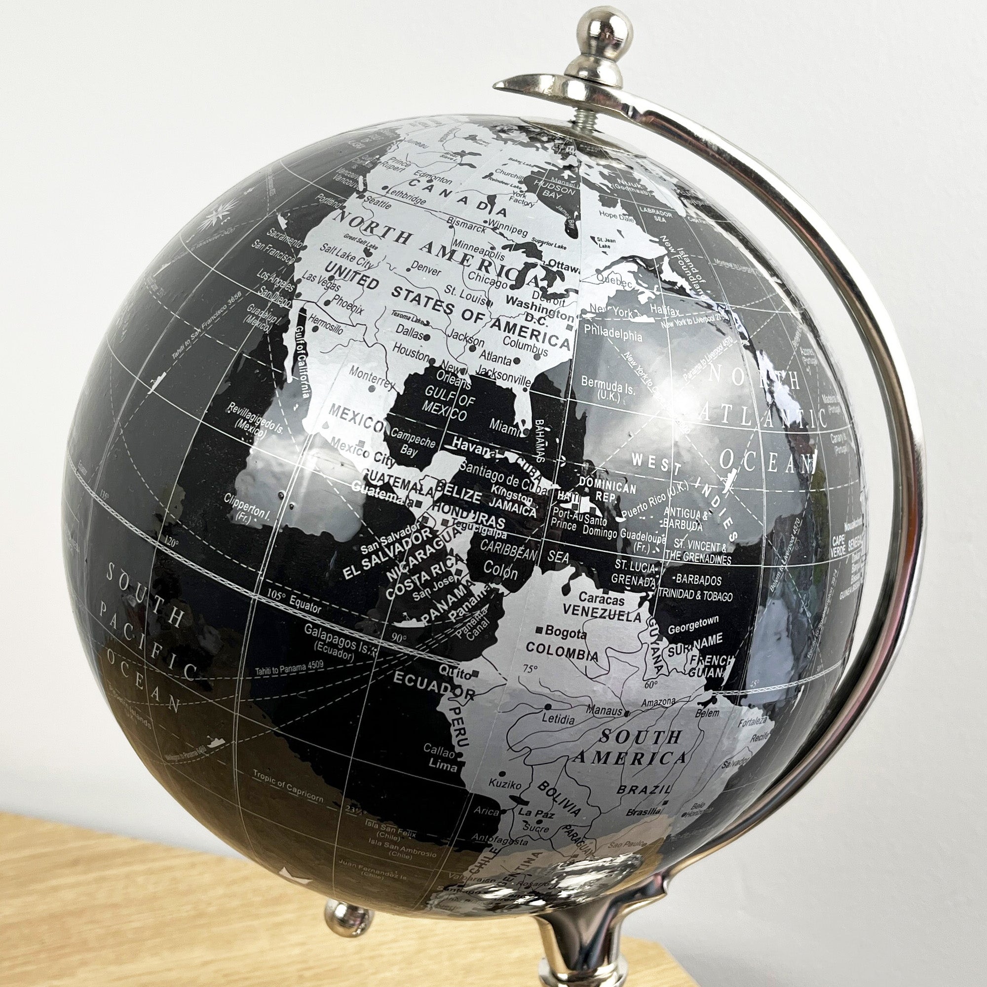 33.5cm Tall Rotating Globe Ornament - Black & Silver
