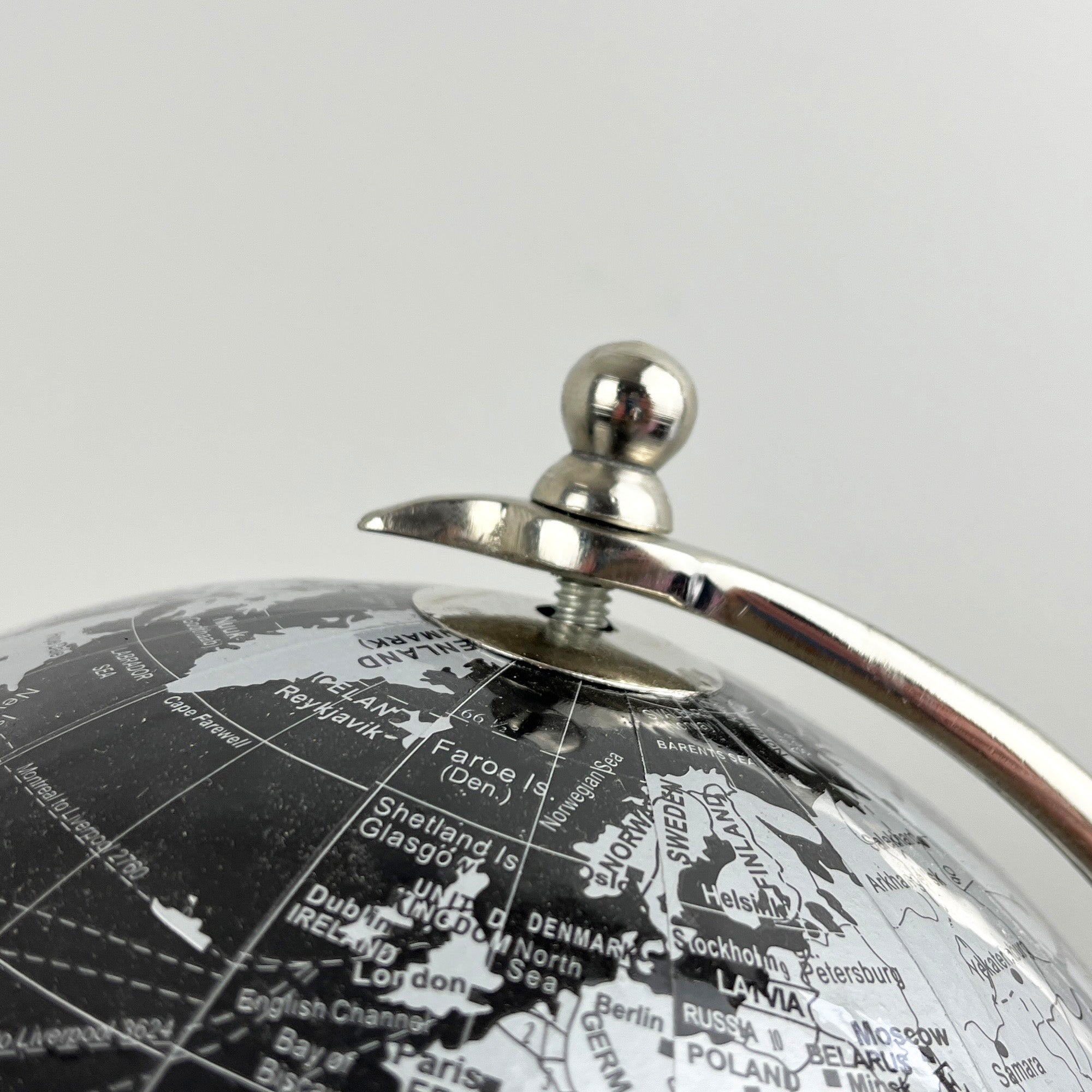 33.5cm Tall Rotating Globe Ornament - Black & Silver