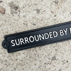 34.5cm 'Surround By Pricks' Funny Cast Iron Wall Sign