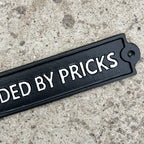 34.5cm 'Surround By Pricks' Funny Cast Iron Wall Sign