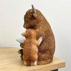18.5cm Highland Cow Reading Ornament – Resin