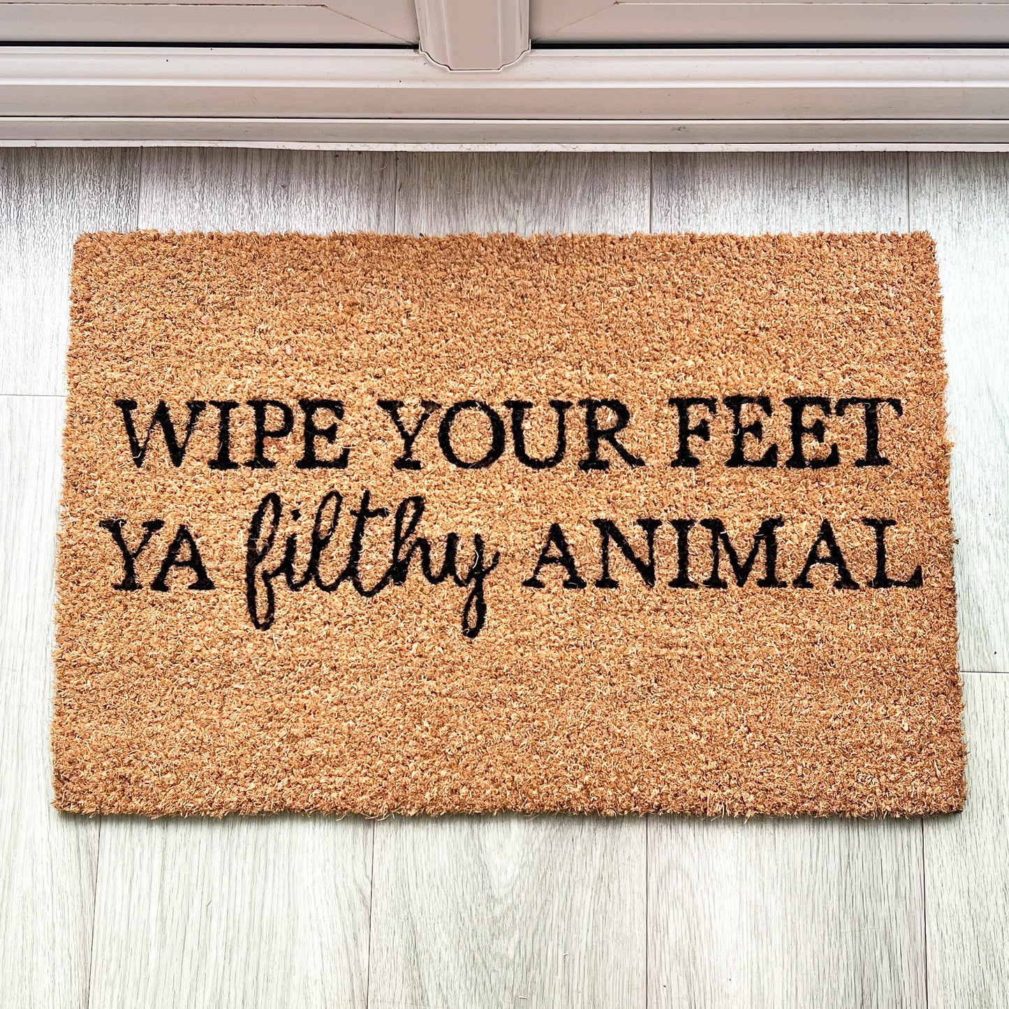 'Wipe Your Feet Ya Filthy Animal' Funny Coir Doormat - 60 x 40cm