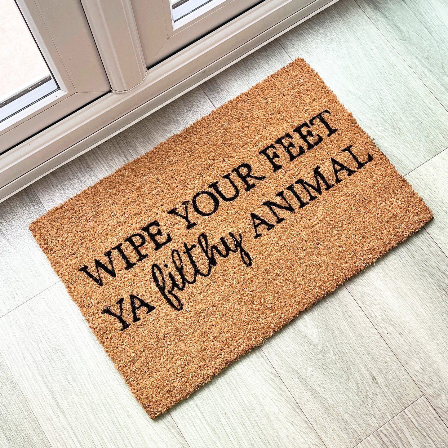 'Wipe Your Feet Ya Filthy Animal' Funny Coir Doormat - 60 x 40cm