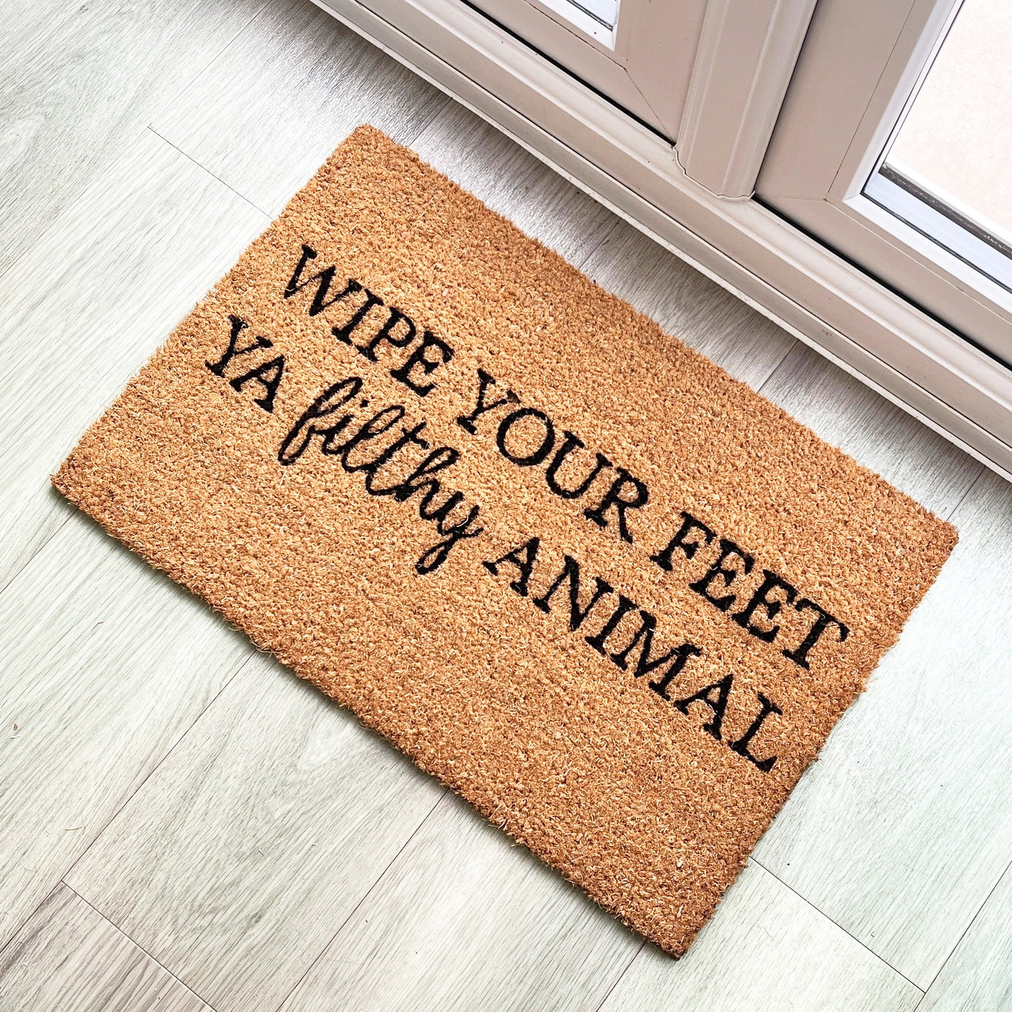 'Wipe Your Feet Ya Filthy Animal' Funny Coir Doormat - 60 x 40cm