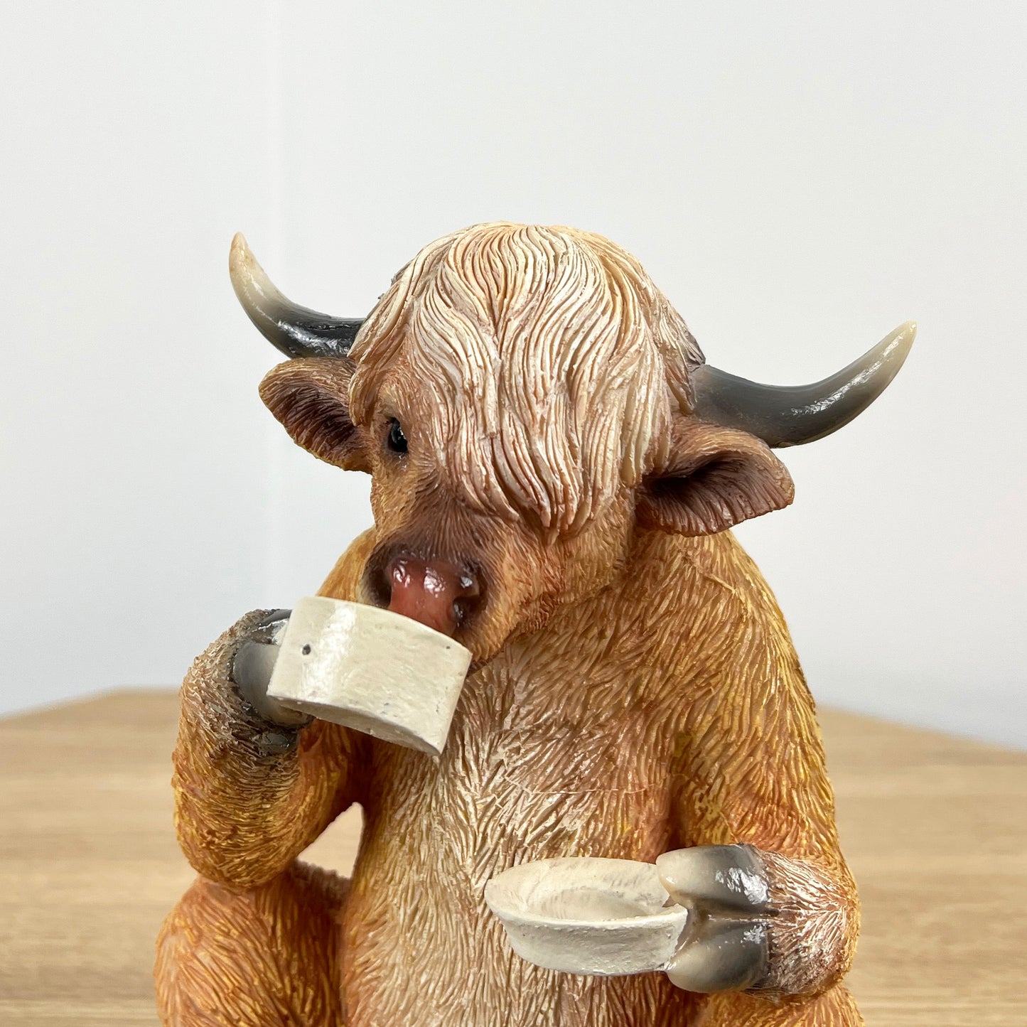 Tea Drinking Highland Cow Ornament - Resin