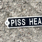 45cm Cast Iron 'Piss Heads Corner' Wall Sign / Plaque