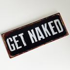 Get Naked Metal Wall Sign Close Up 1