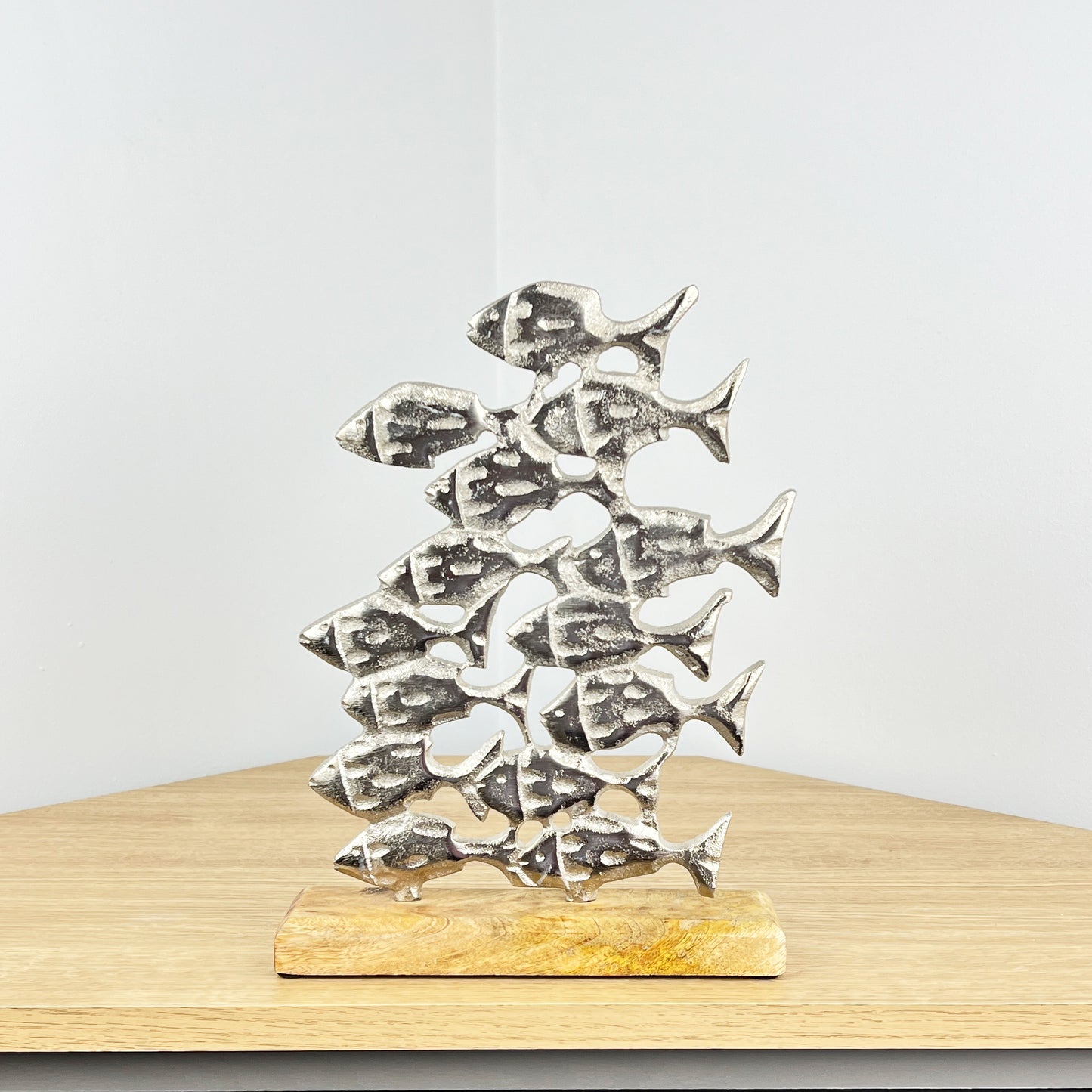 Metal Shoal of Fishes on Wood Ornament