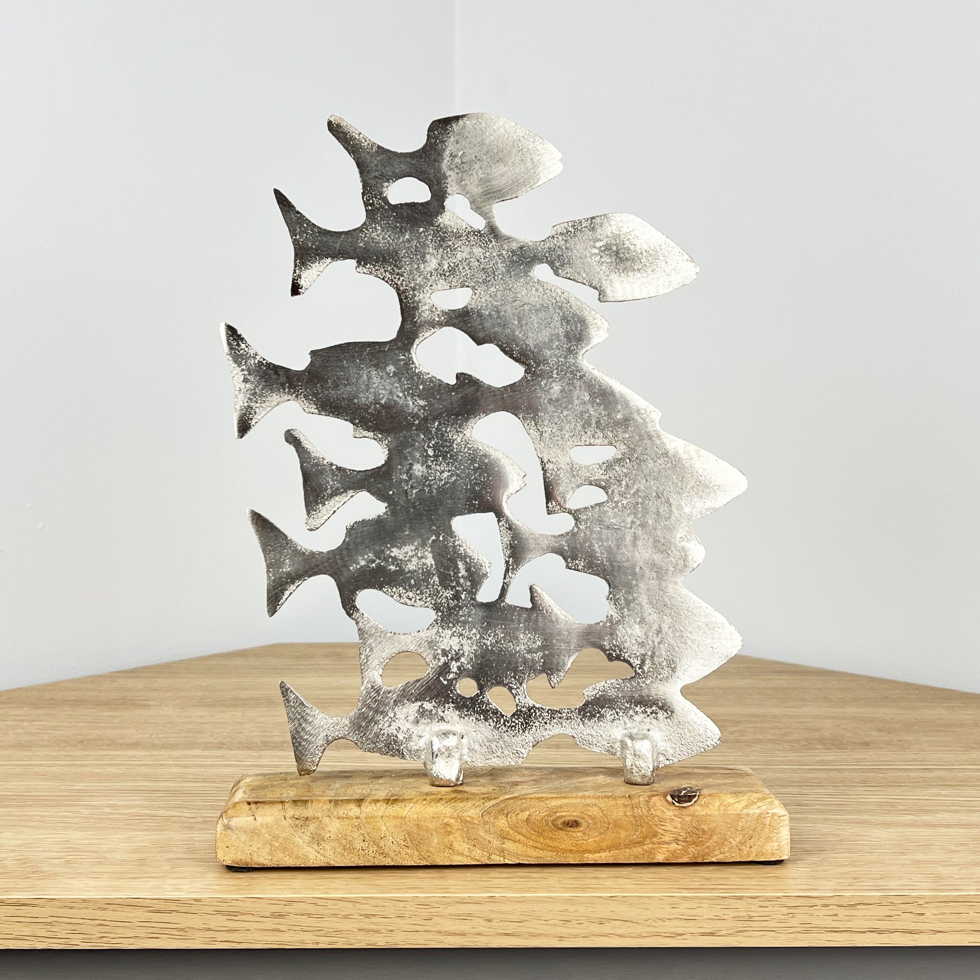 Metal Shoal of Fishes on Wood Ornament