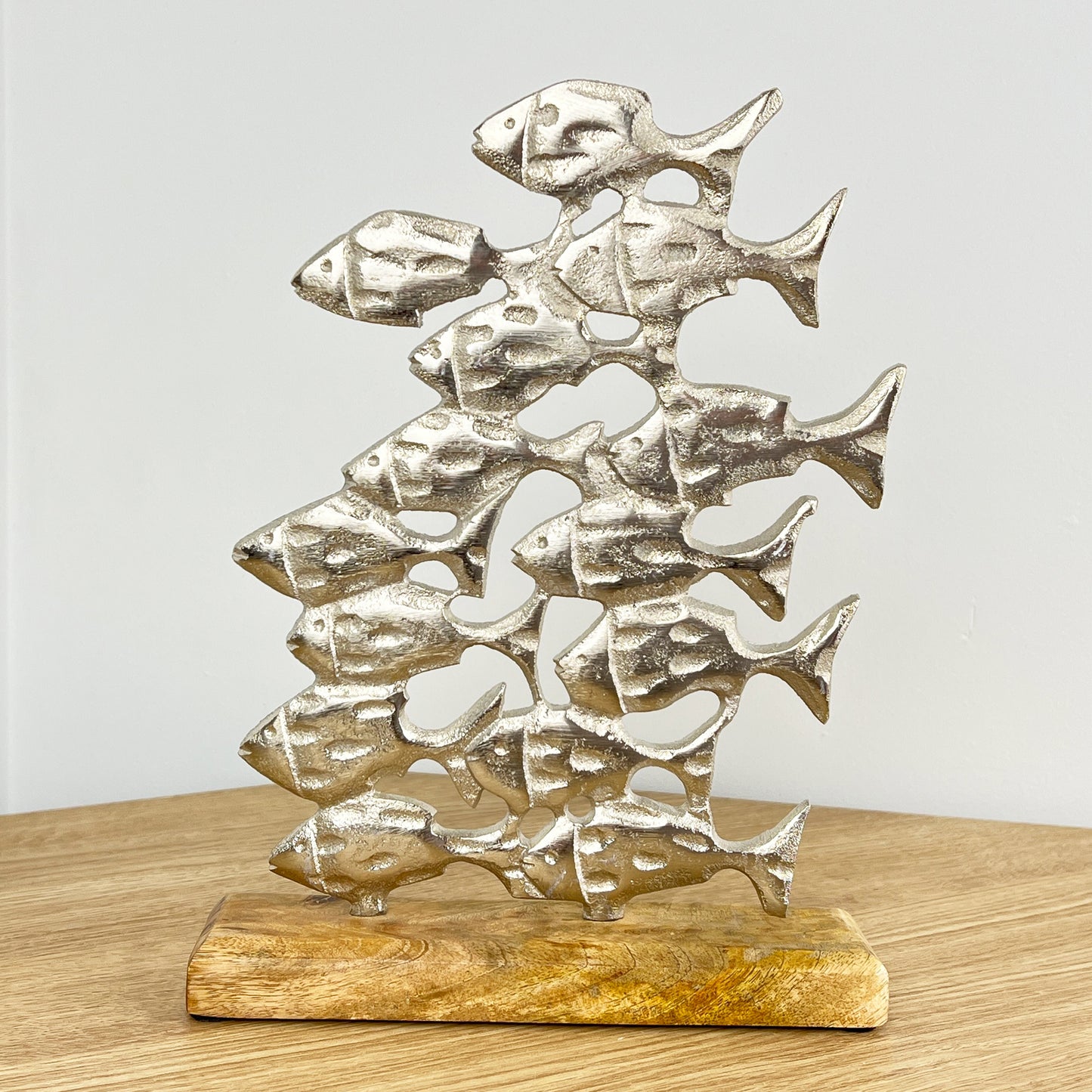 Metal Shoal of Fishes on Wood Ornament